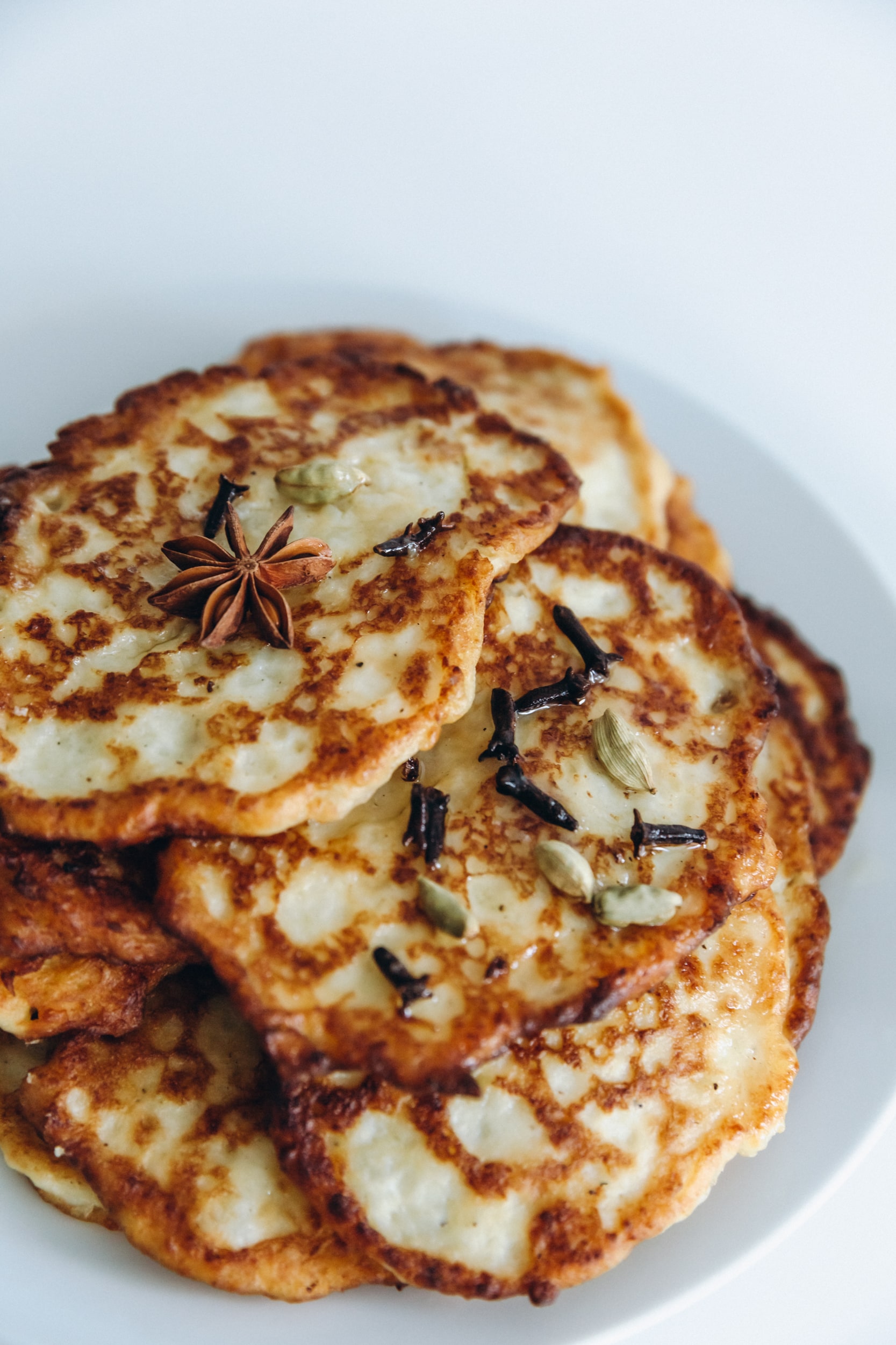 Potato pancakes and honey with spices